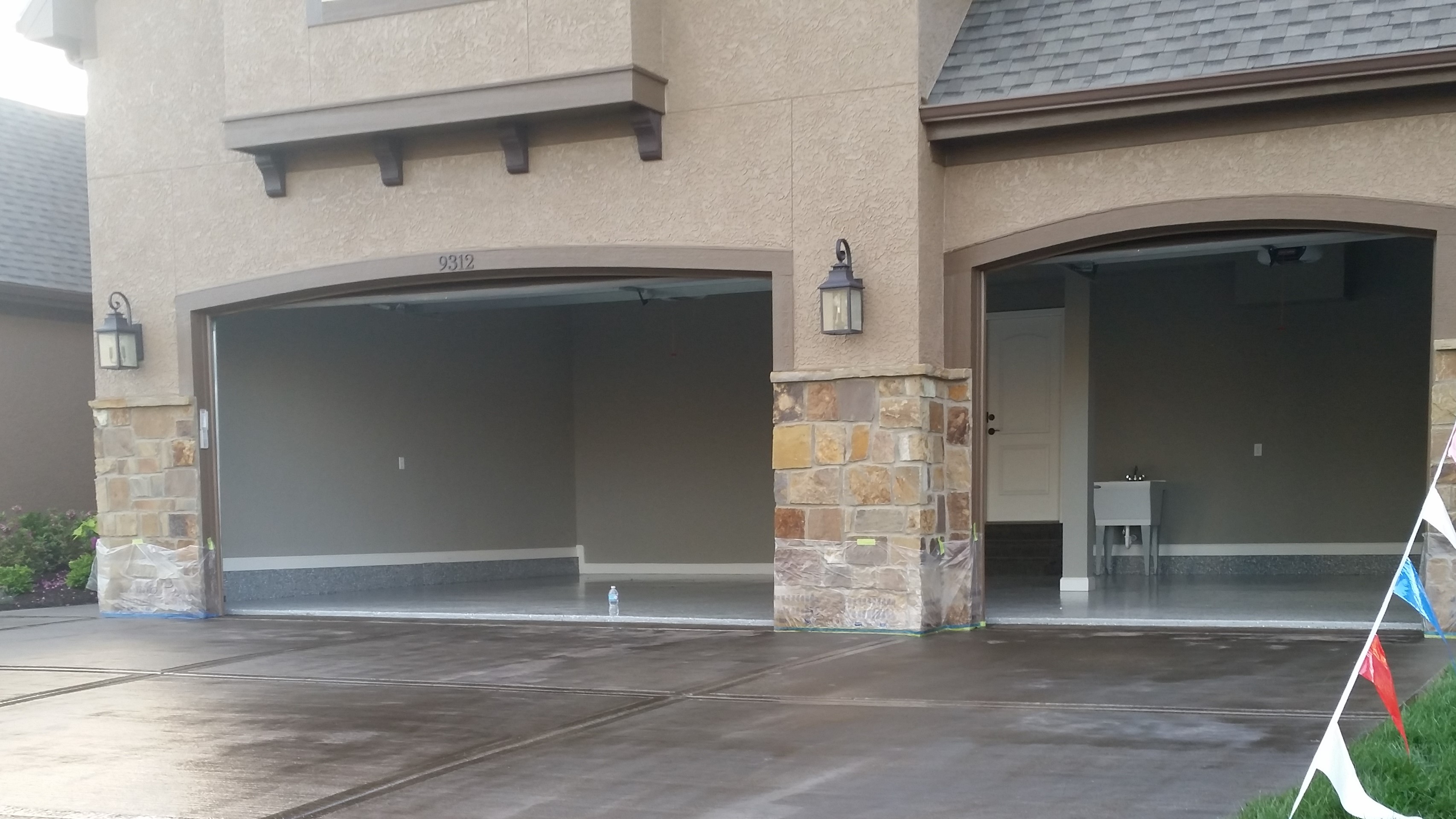 Two-story home exterior painting in Johnson County